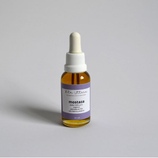 Mustard oil. 100% pure and organic. Cold-pressed. Powerful aroma and flavor. Uses: cooking, cosmetics, and therapeutics. Glass bottle.